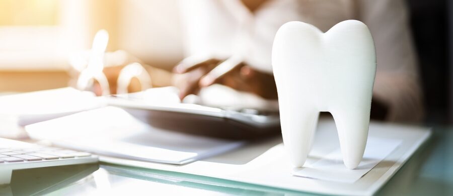 HealthGuys licensed agent helping Dallas Fort Worth resident compare dental insurance plan options for individuals and families