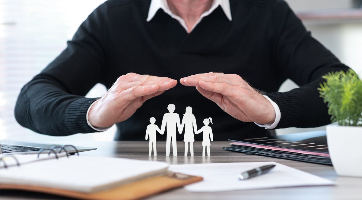 Texas family reviewing Medi-Share monthly contribution options with HealthGuys insurance agent Texas family reviewing Medi-Share monthly contribution options with HealthGuys insurance agent