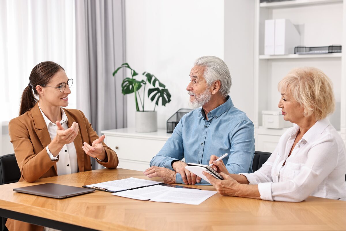 Senior couple meeting with HealthGuys insurance agent about long-term care insurance in Dallas Fort Worth TX Senior couple meeting with HealthGuys insurance agent about long-term care insurance in Dallas Fort Worth TX