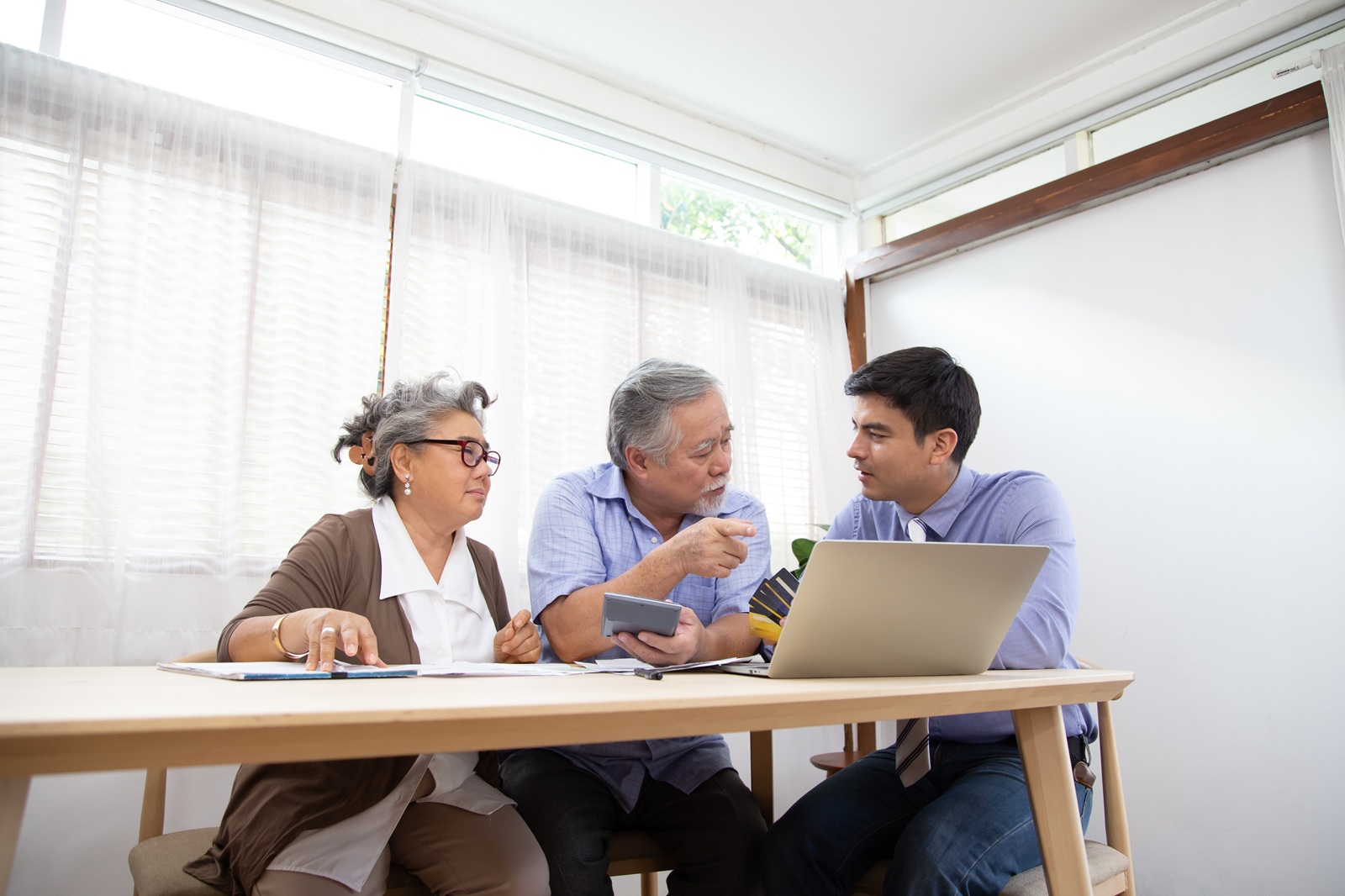 Dallas-Fort Worth resident with a health condition reviewing no medical exam life insurance options with a HealthGuys agent